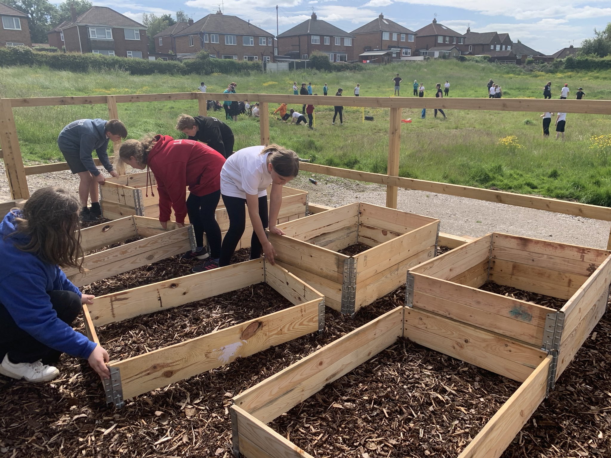 Landscape supplier Green-tech digs deep to help a primary school create a community allotment